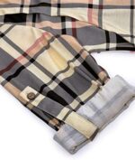 Button tab detail on rolled plaid sleeve