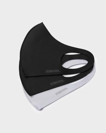 Stack of black and grey stretch face masks with fabric ear loops