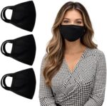 Three black cotton masks next to a model wearing one
