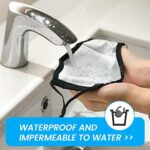 Cloth mask being rinsed under a running faucet