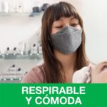 Woman wearing the gray 3M daily face mask in a store