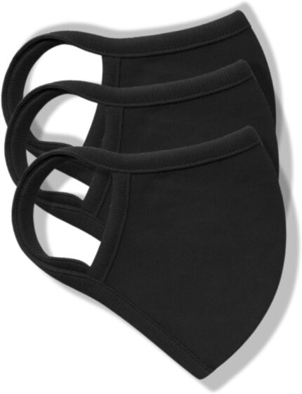 Three solid black cotton face masks stacked together