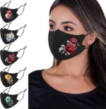 Set of five black flower masks with a red and white rose design shown on a model