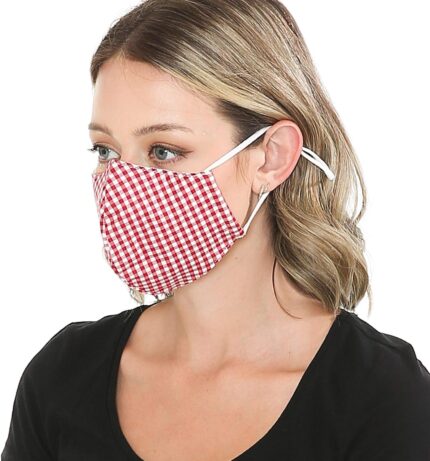 Woman wearing a red checker cotton face mask, side view