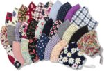 HOPE LOVE SHINE assorted print cotton face masks fanned out in floral, plaid and solid fabrics