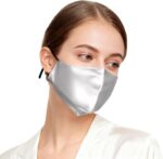 Mulberry silk face mask for adults in light gray, worn by a model