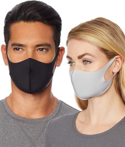 Polyester spandex face mask 3 pack shown on a man in black and a woman in grey